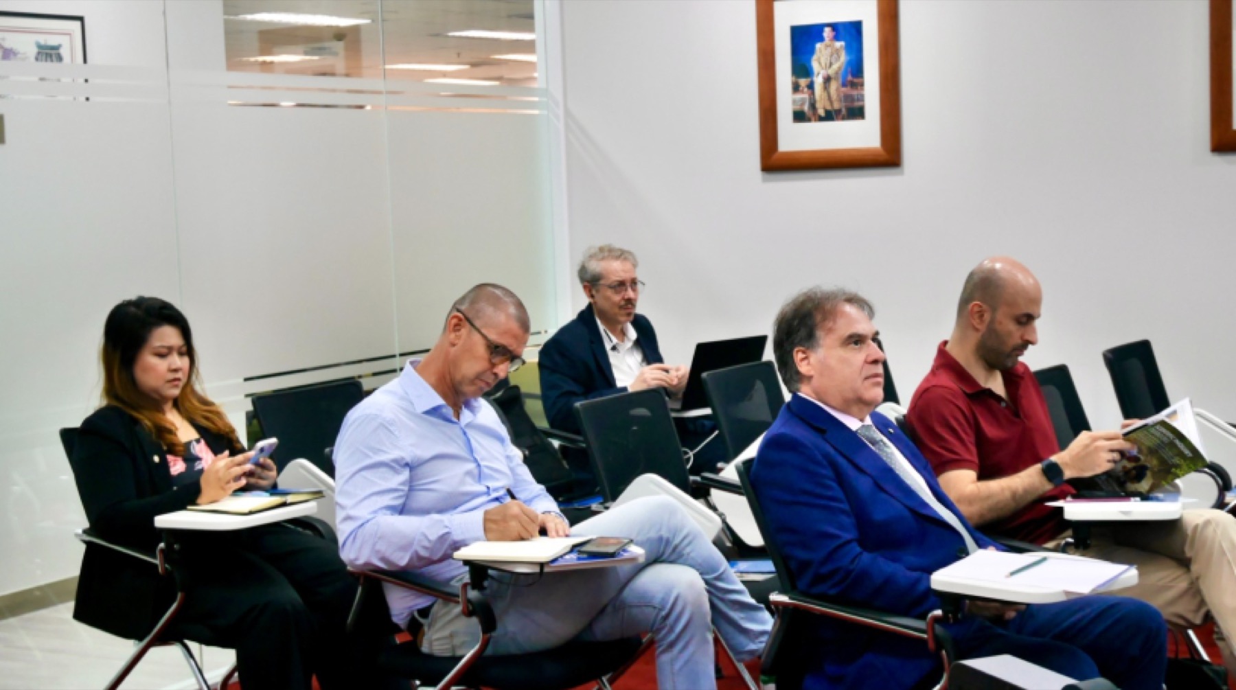 Speakers at the seminar table